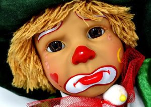 Playful kid clown, illustrating how mastering complex topics like present indefinite tense examples rules usage common mistakes can be fun.