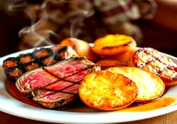 Premium Beef Steak with Herb-Roasted Potatoes on Fine China