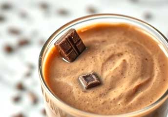 Braces-safe chocolate spinach smoothie with banana and milk — nutritious, smooth, and dentist-approved.