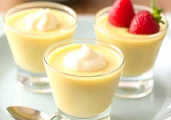 Custard or pudding cups — creamy, braces-friendly desserts served in soft, spoonable portions.