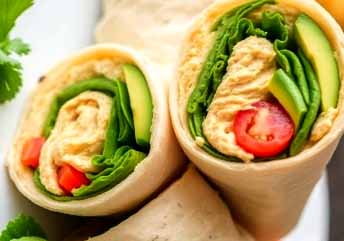 Hummus and avocado roll-up — a soft, braces-friendly wrap filled with creamy, nutritious ingredients.