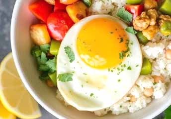 Rice bowl with soft vegetables and a tender egg — a braces-friendly, nourishing side dish for soup.