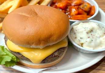 Fast-food meal with soft burger and mashed sides — a braces-friendly combo of tender textures and comfort flavors. what foods can you eat with braces