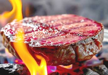 Sliced medium rare steak with a warm red center and seared crust, showcasing steak doneness for safe cooking and flavorful results.