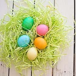 A rustic kitchen setting with five farm eggs on a scale to measure Calories in 5 eggs for meal planning.