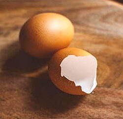 A 1/2 cup serving of egg white protein being prepared for a fitness meal.