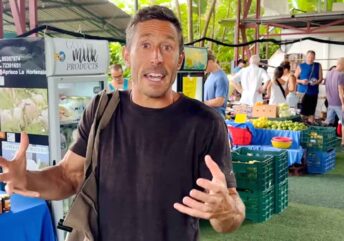 Functional medicine physician Dr. Paul Saladino, creator of Carnivore MD, presenting a high-fat animal-based meal with grass-fed ribeye, beef liver, and fresh papaya.